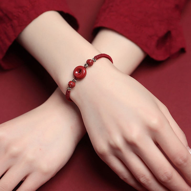 Pulsera trenzada de bendición con hebilla de paz y cinabrio de loto hecha a mano con Buddha Stones