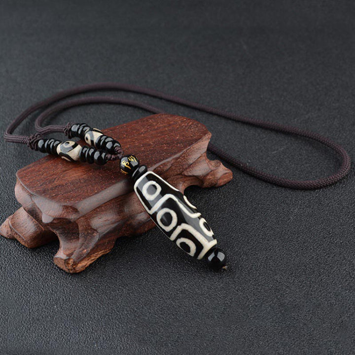 Collar de protección de la riqueza con cuentas Dzi de nueve ojos y Buddha Stones