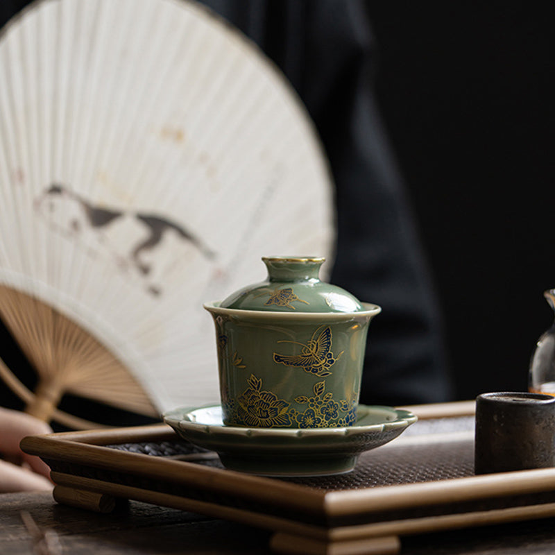 Buddha Stones de porcelana verde, mariposa, flor, salmón, pescado, cerámica, Gaiwan Sancai, taza de té de Kung Fu y platillo con tapa