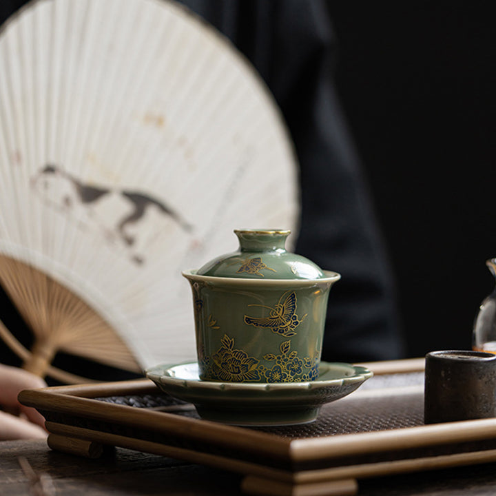 Buddha Stones de porcelana verde, mariposa, flor, salmón, pescado, cerámica, Gaiwan Sancai, taza de té de Kung Fu y platillo con tapa