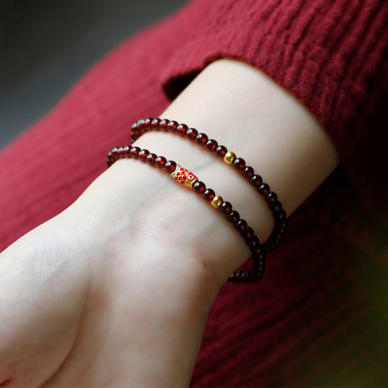 Pulsera de protección con granate natural y pez Koi de oro 999 de Buddha Stones - image 9