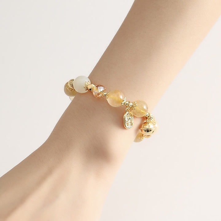 Pulsera con amuleto de la fortuna de la suerte, campana de la riqueza, cuarzo rutilado dorado, chapado en oro de 14 quilates con Buddha Stones