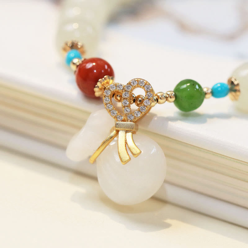 Pulsera de bendición para bolsa de dinero chapada en oro de 14 quilates con jade blanco hetiano natural con Buddha Stones