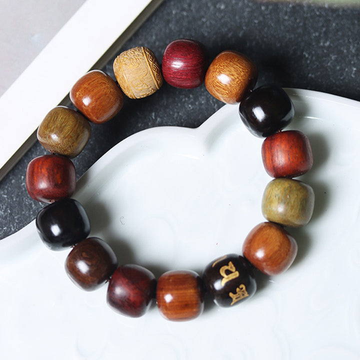 Pulsera de pureza Om Mani Padme Hum de varias maderas del Tíbet con Buddha Stones