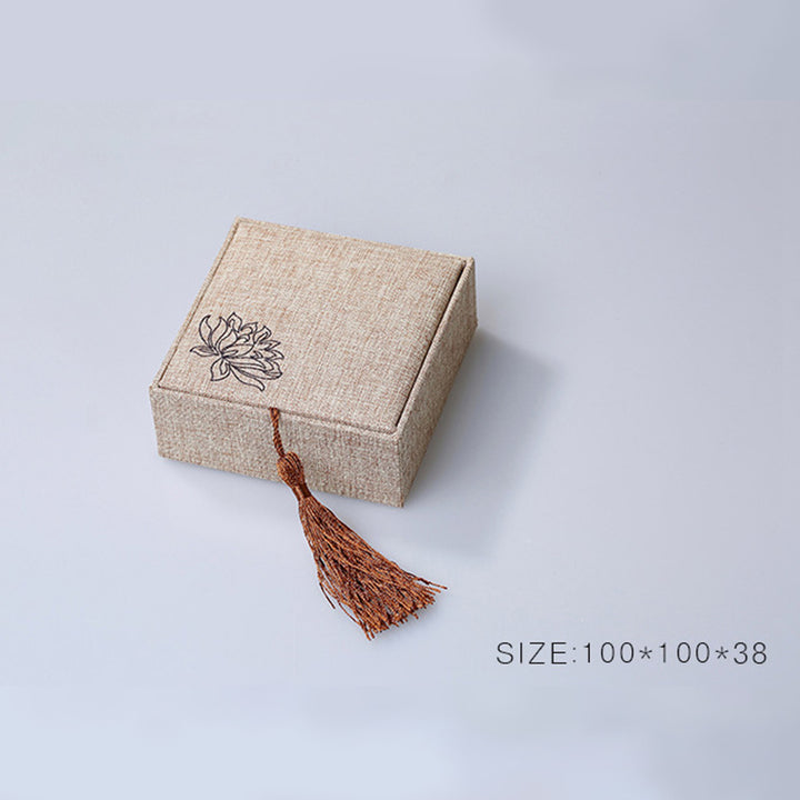 Caja de almacenamiento de joyería con diseño de loto y Buddha Stones, caja de regalo con borlas