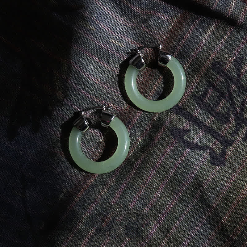 Pendientes de prosperidad de jade blanco redondo de Buddha Stones