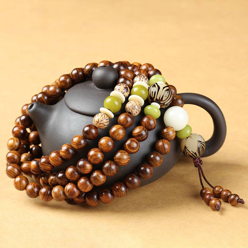Pulsera Calma de Protección Mala de Palosanto Tibetano con Buddha Stones