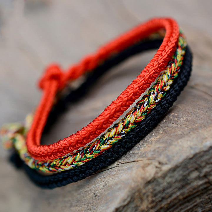 Pulsera de cuerda trenzada con protección de nudo de paz de ocho hilos hecha a mano tibetana con Buddha Stones