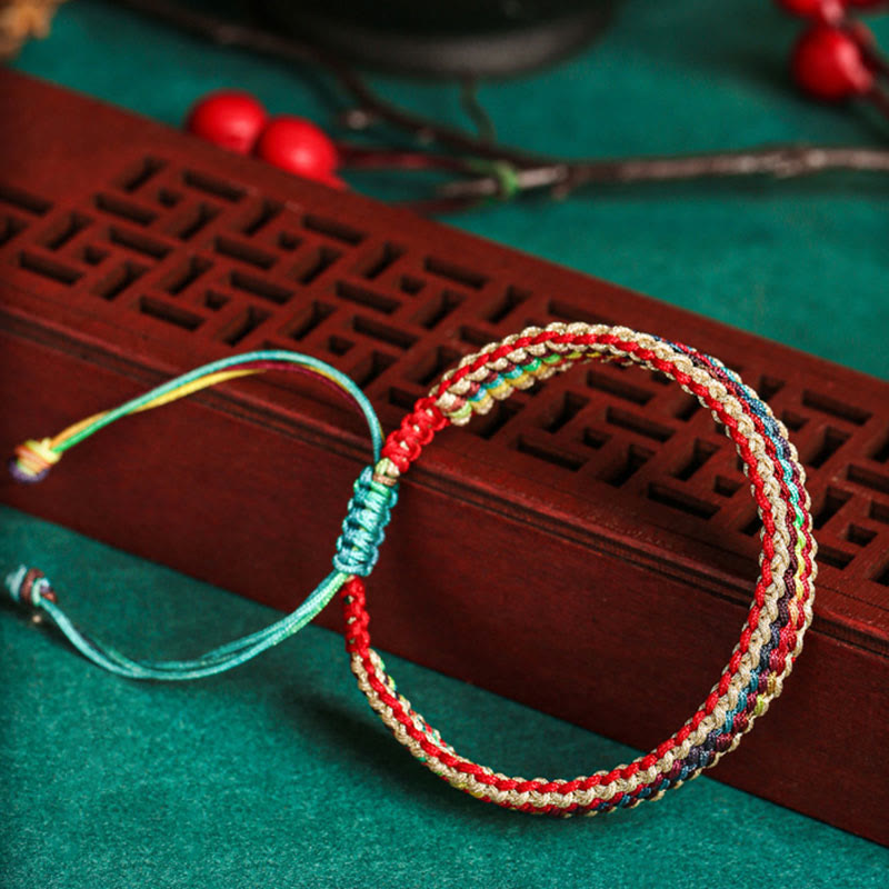 Pulsera de hilo trenzado con protección multicolor de arcoíris hecha a mano con Buddha Stones del Tíbet