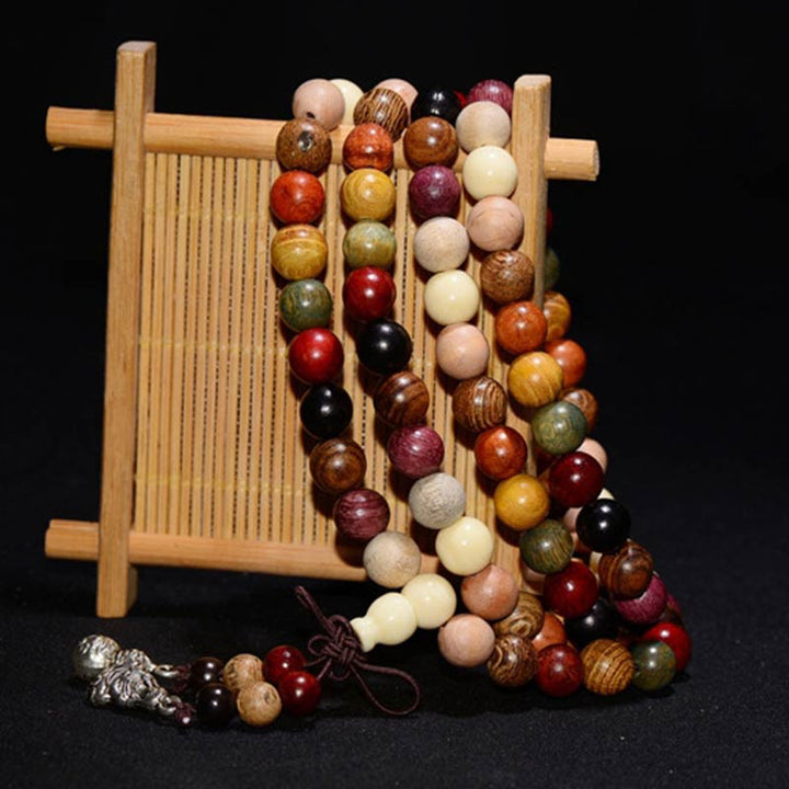 Pulsera de meditación de bendición Mala de madera de wengué con 108 Buddha Stones