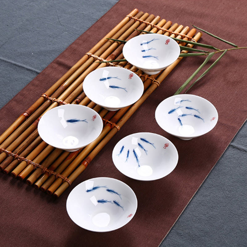 Buddha Stones Jingdezhen, porcelana azul y blanca, pez Koi, taza de té de cerámica, tazas de té de Kung Fu