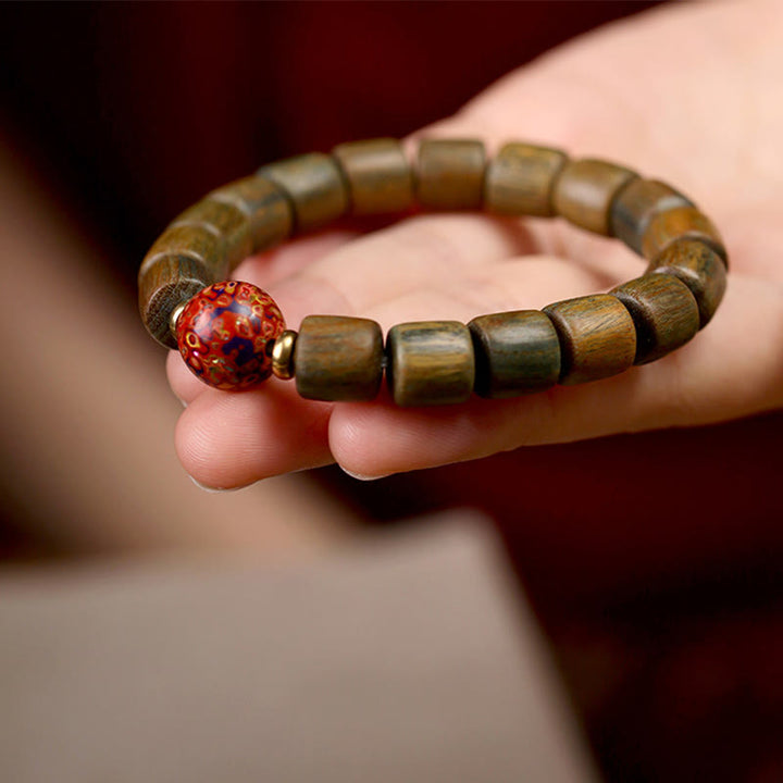 Pulsera de la paz con cuentas de laca de sándalo rojo de hoja pequeña de sándalo verde natural con Buddha Stones