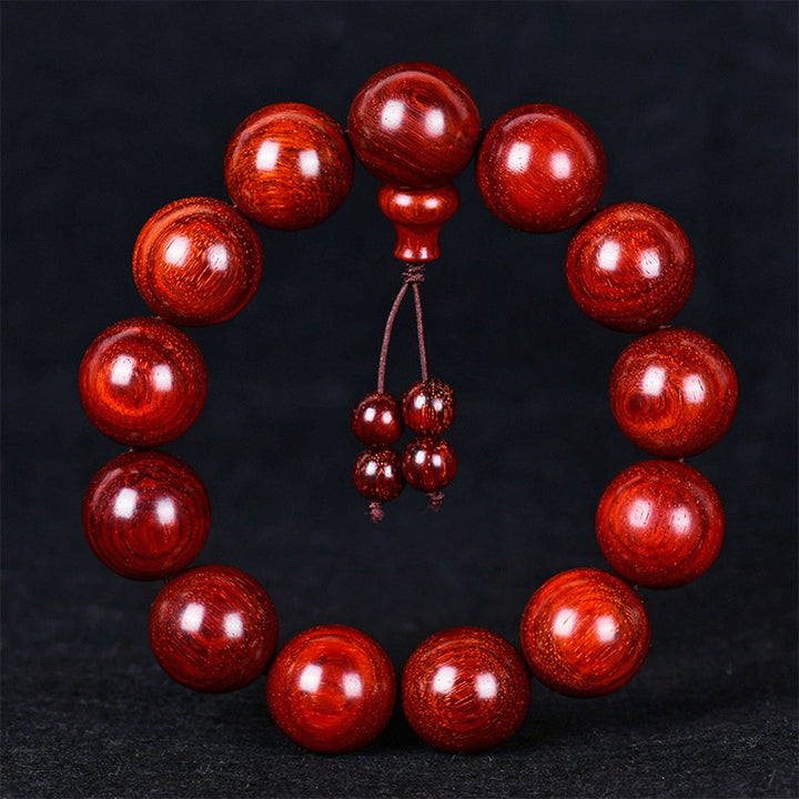 Pulsera de equilibrio de sándalo rojo con hoja pequeña tibetana de Buddha Stones