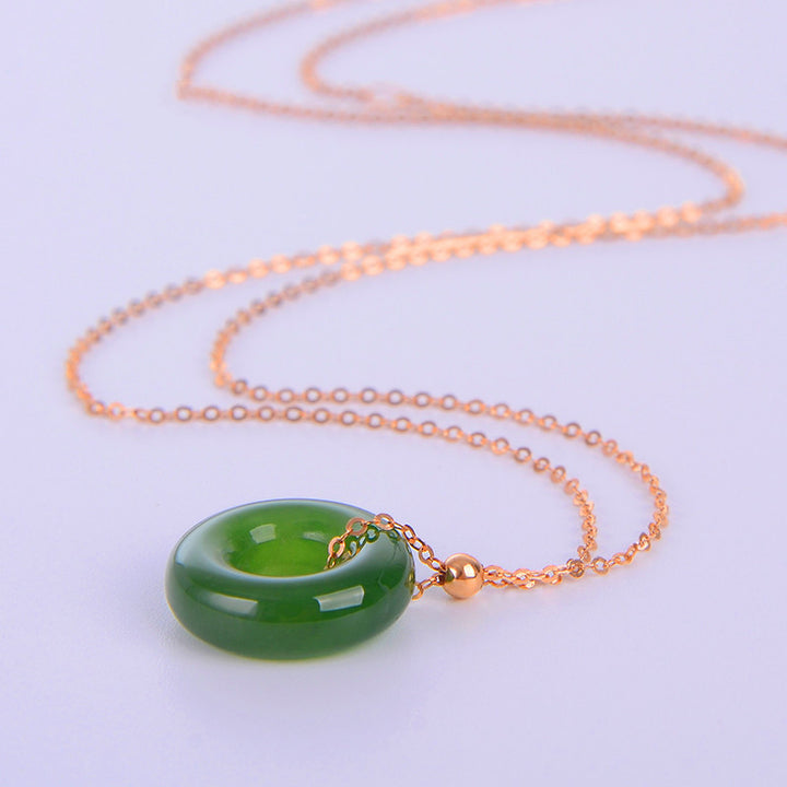 Colgante de collar de oro de 14 quilates curativo de jade cian redondo