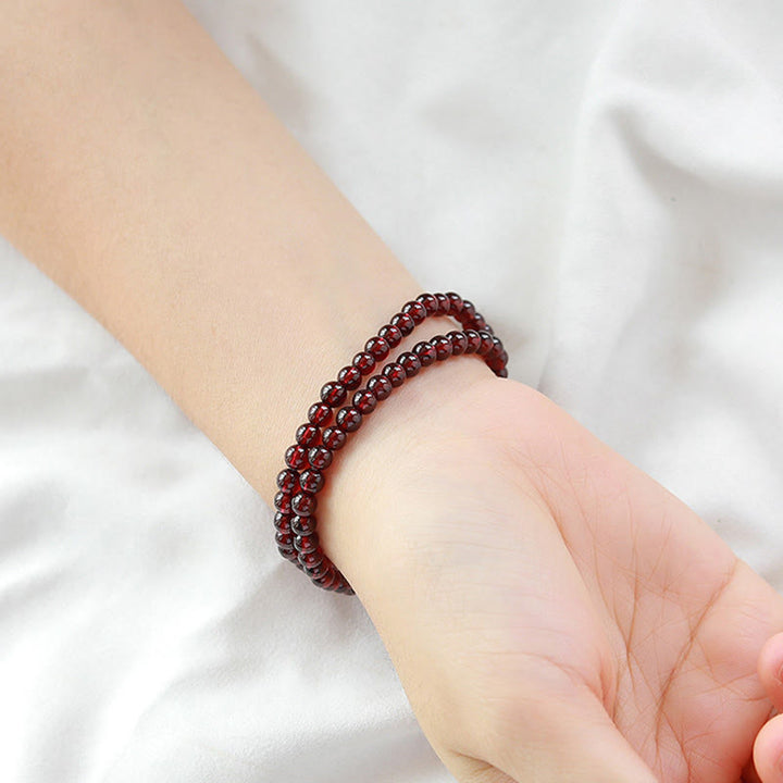 Pulsera de doble vuelta con estabilidad de cuarzo fresa y granate natural chapada en oro de 14 quilates con Buddha Stones