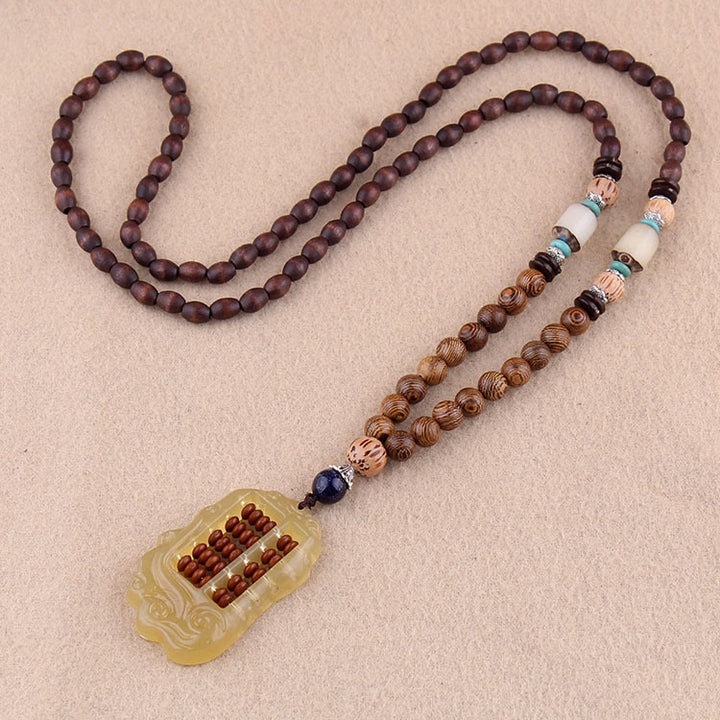 Buddha Stones, colgante de collar de paz de equilibrio de ágata de semilla Bodhi de madera de wengué tibetano
