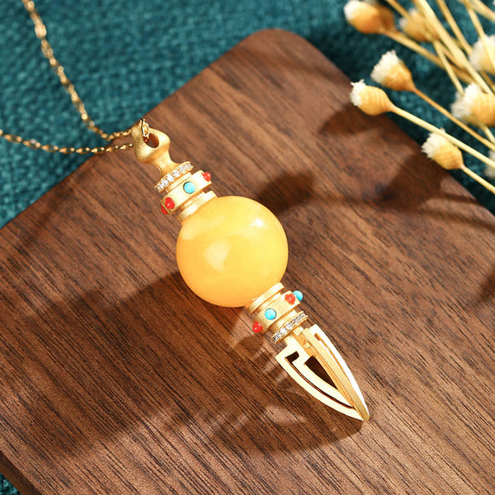 Colgante de collar de ansiedad transparente Dorje Vajra de ámbar chapado en oro de 24 quilates