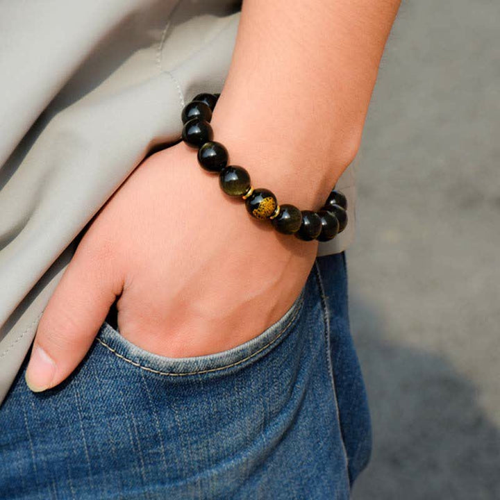 Pulsera de protección de la riqueza de obsidiana con brillo dorado del Buda Natal del zodíaco chino