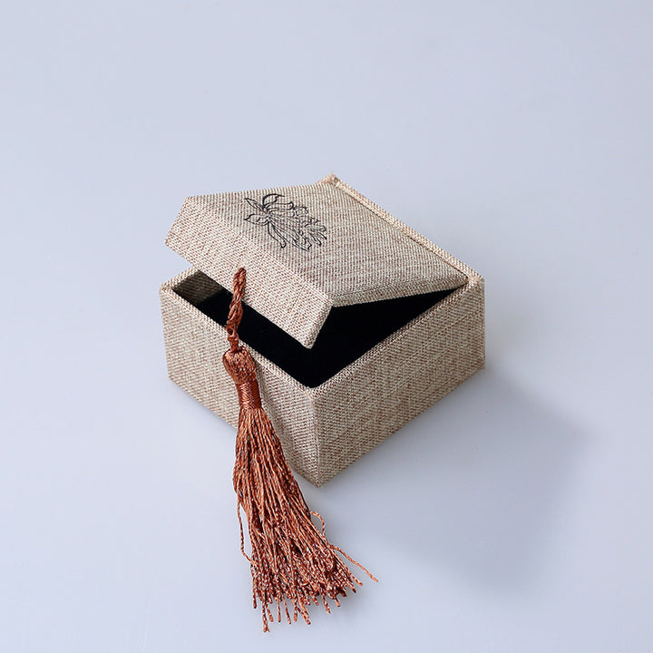 Caja de almacenamiento de joyería con diseño de loto y Buddha Stones, caja de regalo con borlas