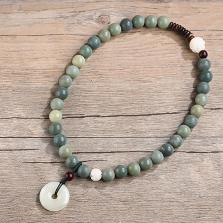 Pulsera de doble envoltura con hebilla de paz y jade de loto, semilla de Bodhi cian