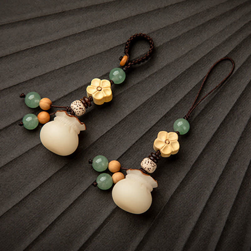 Llavero de prosperidad y bendición de flores, bolsa de dinero con semillas de Bodhi Natural, Buddha Stones