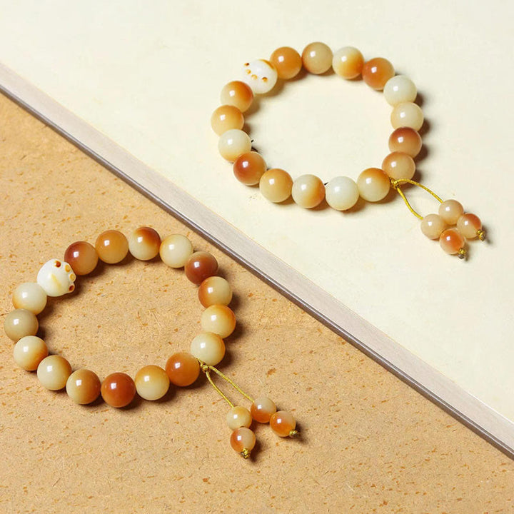 Pulsera de sabiduría de la paz con garra y semilla de Bodhi Natural de Buddha Stones