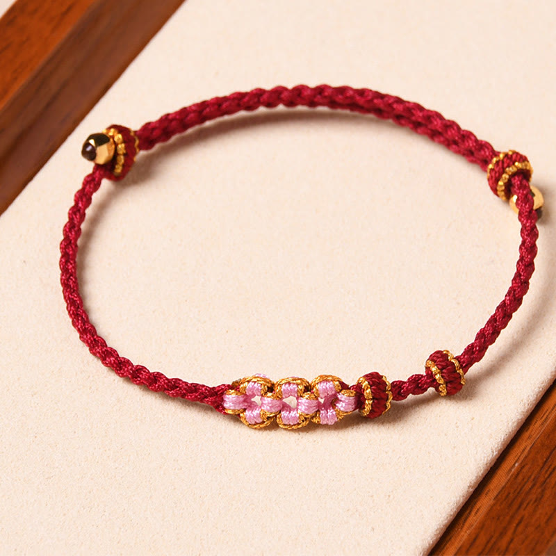 Pulsera de cuerda trenzada con protección de flor de melocotón hecha a mano con Buddha Stones