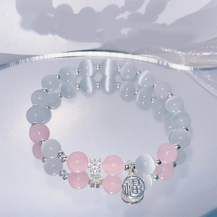 Pulsera de soporte con dije de personaje Fu de campana de flor de melocotón de cristal de ojo de gato con Buddha Stones