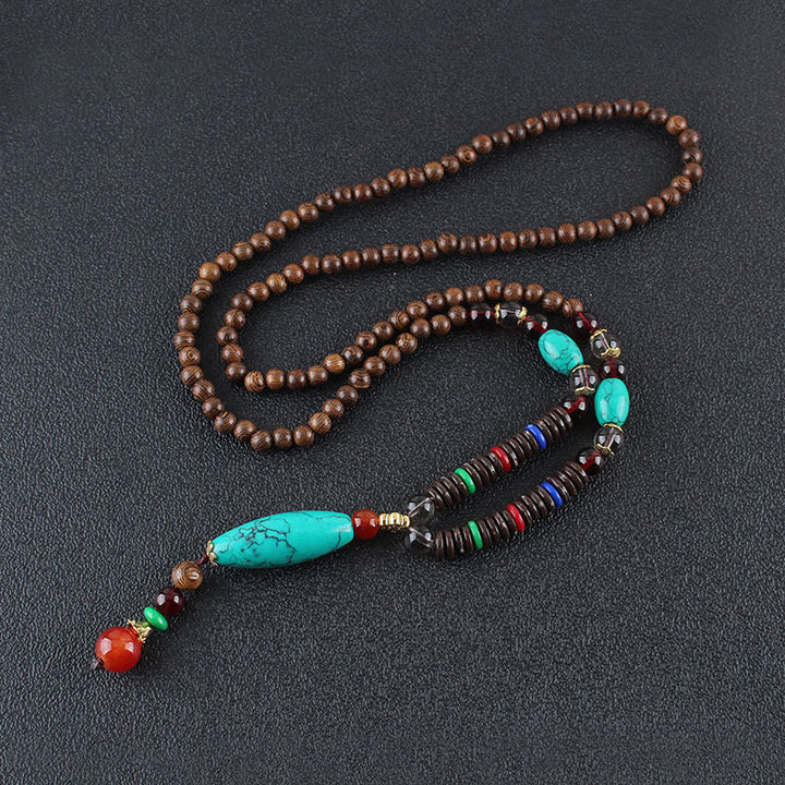 Buddha Stones Madera de wengué Piedra turquesa Protección Calma Collar Colgante