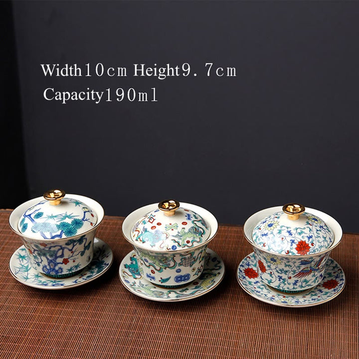 Buddha Stones Retro, flor de ciruelo, pino, bambú, Phoenix Kirin, cerámica Gaiwan Sancai, taza de té de Kung Fu y platillo con tapa