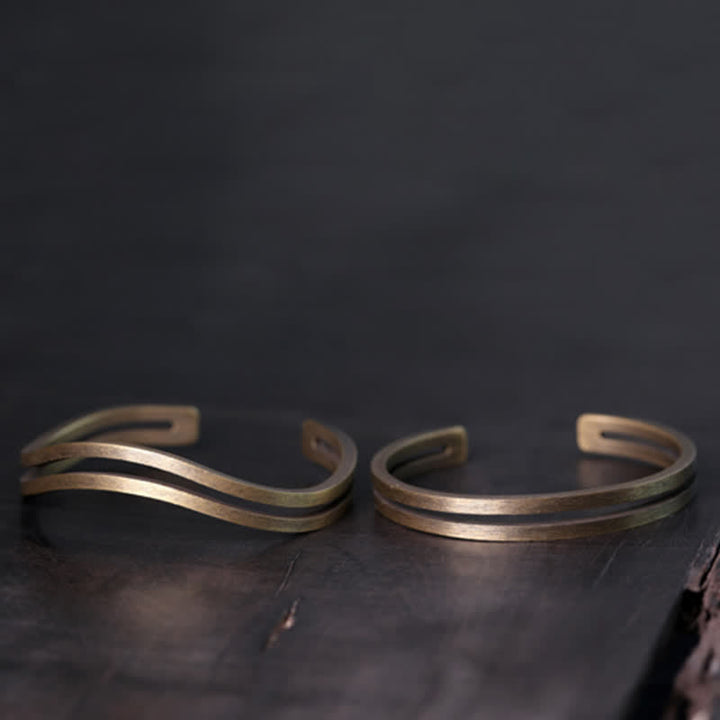 Pulsera vikinga de la suerte de cobre rústico con Buddha Stones