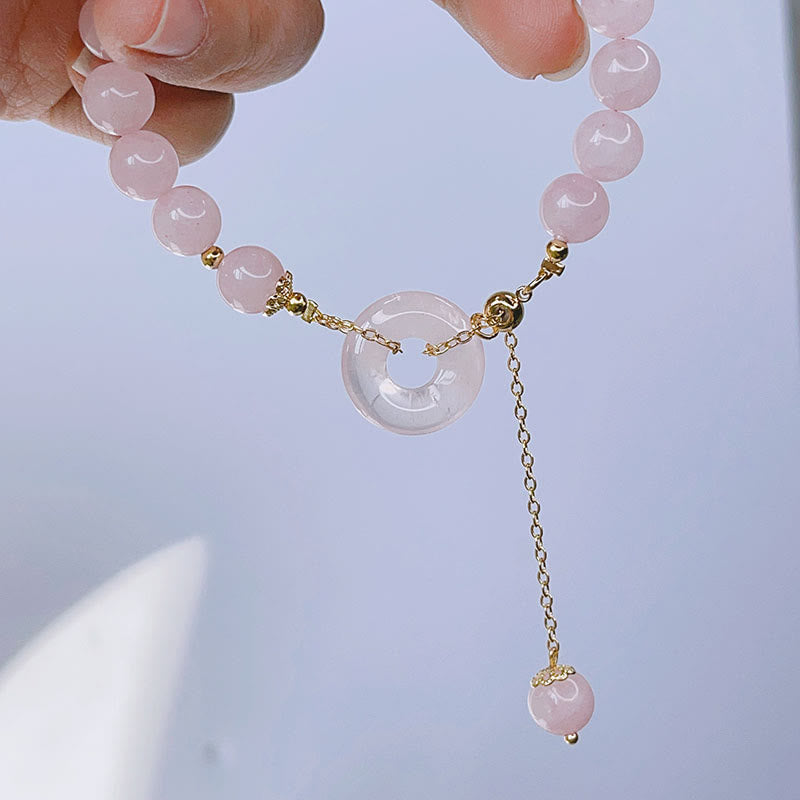 Pulsera con dije de amor con hebilla de paz y cristal rosa natural con Buddha Stones