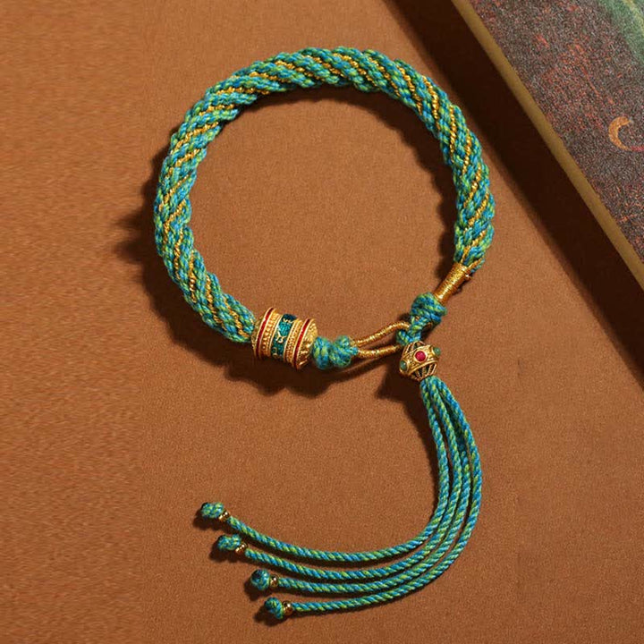 Pulsera de cuerda tejida con dije de rueda de oración Thangka de la suerte hecha a mano tibetana con Buddha Stones