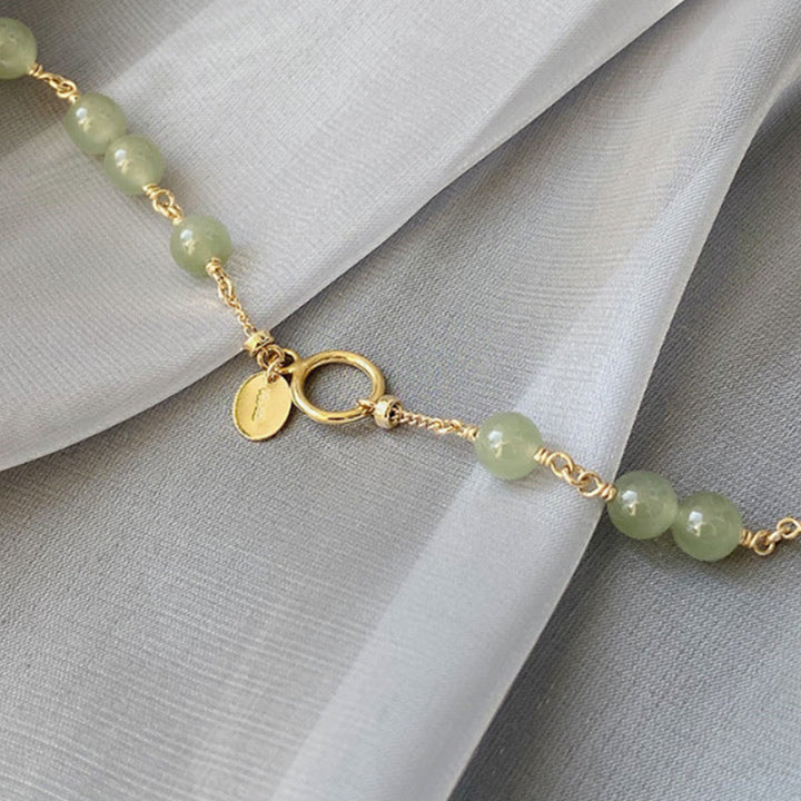Pulsera de cadena de prosperidad con cuentas de jade hetiano chapada en oro de 14 k