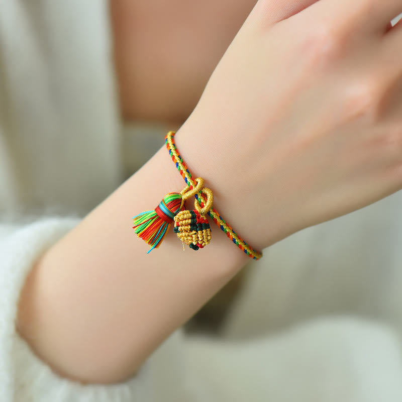 Pulsera con dije de bola dorada Zongzi hecha a mano con cuerda colorida y Buddha Stones