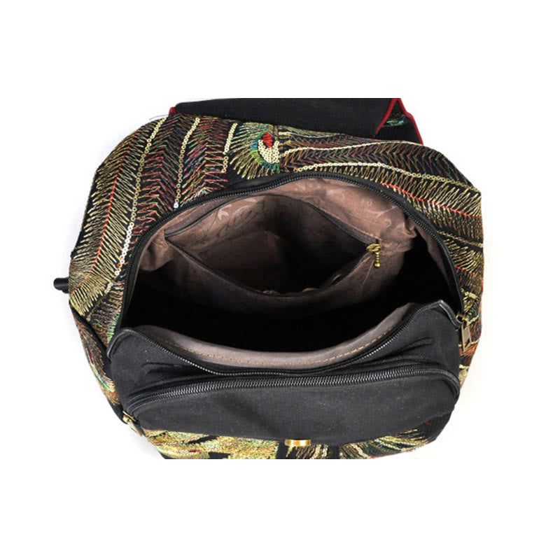 Mochila con borlas de lona con bordado de pavo real