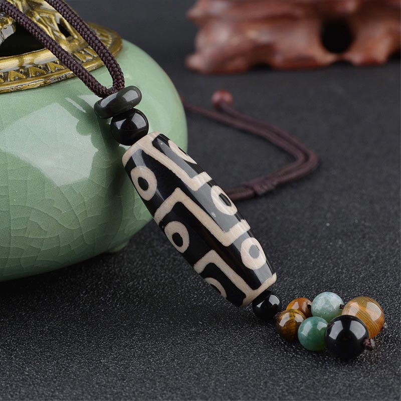 Collar de protección de la riqueza con cuentas Dzi de nueve ojos y Buddha Stones