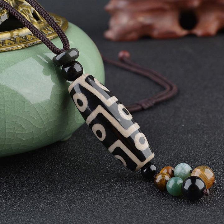 Collar de protección de la riqueza con cuentas Dzi de nueve ojos y Buddha Stones