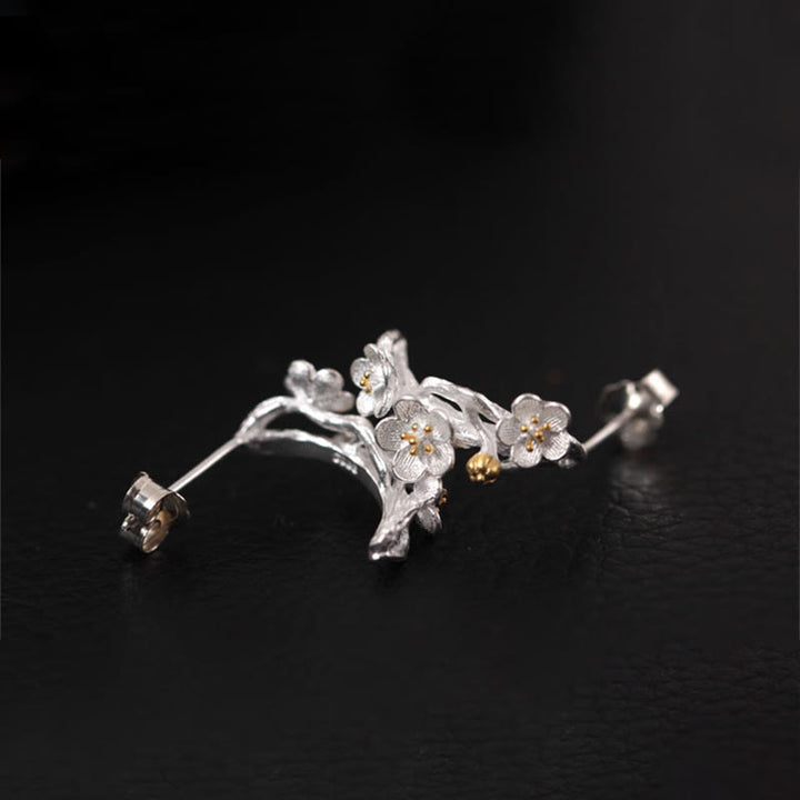 Pendientes de bendición floral de flor de ciruelo de plata de ley 925 con Buddha Stones