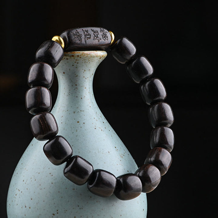 Pulsera de equilibrio de la suerte y el tesoro, cuentas de barril de madera de ébano tibetano, Buddha Stones