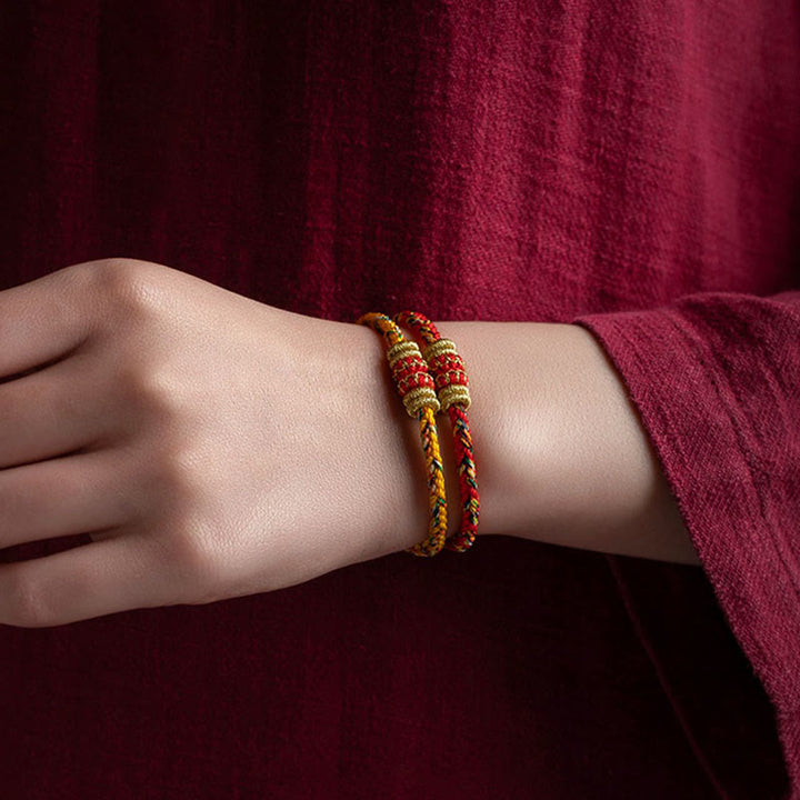 Pulsera de cuerda trenzada de fuerza de la suerte del Buda Natal del zodíaco chino hecha a mano del Tíbet con Buddha Stones