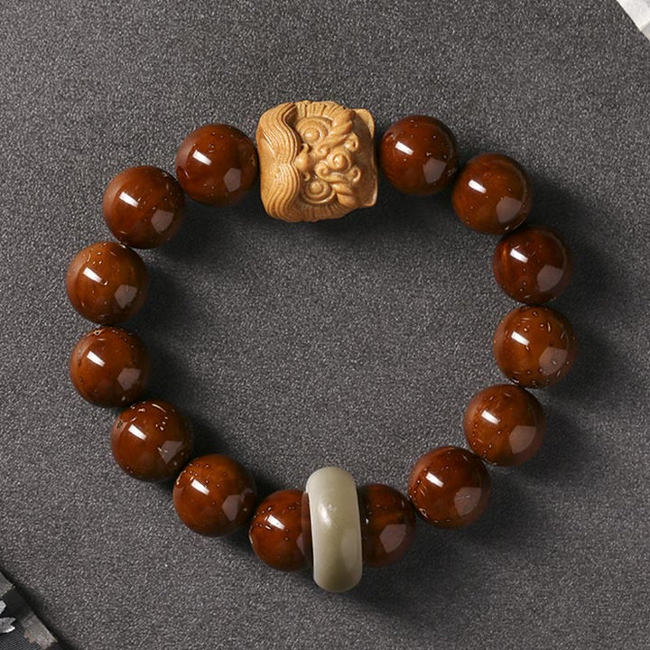 Pulsera de sabiduría de león danzante con semillas de Bodhi moradas con Buddha Stones