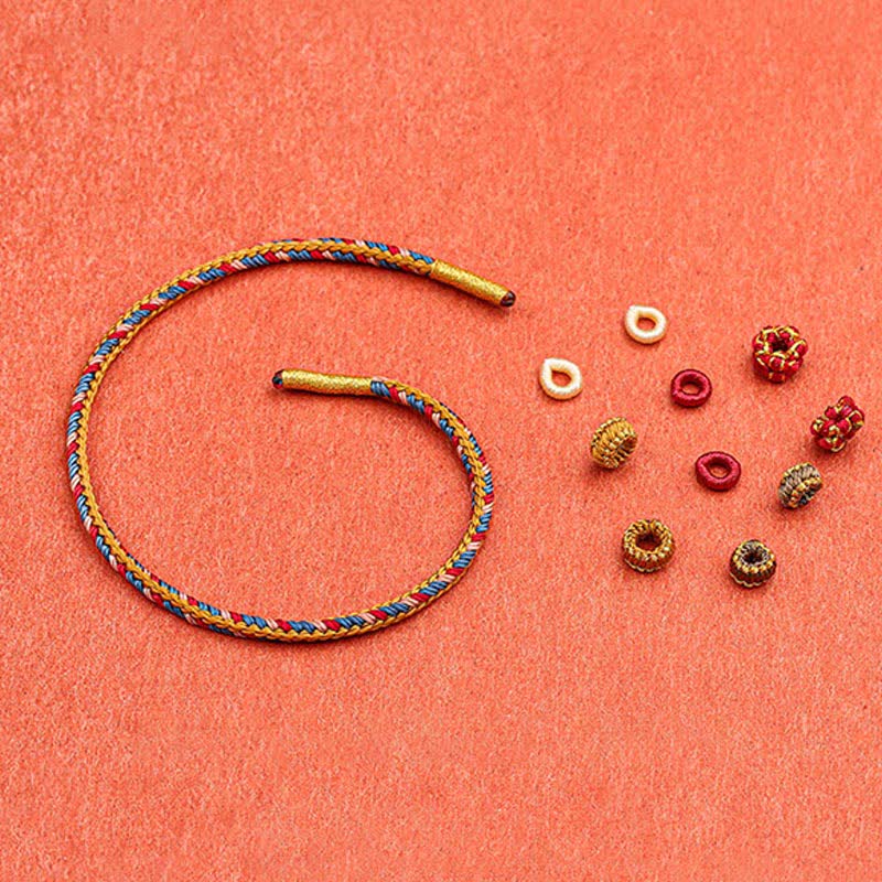 Pulsera de hilo trenzado de la suerte de color Dunhuang hecha a mano con Buddha Stones