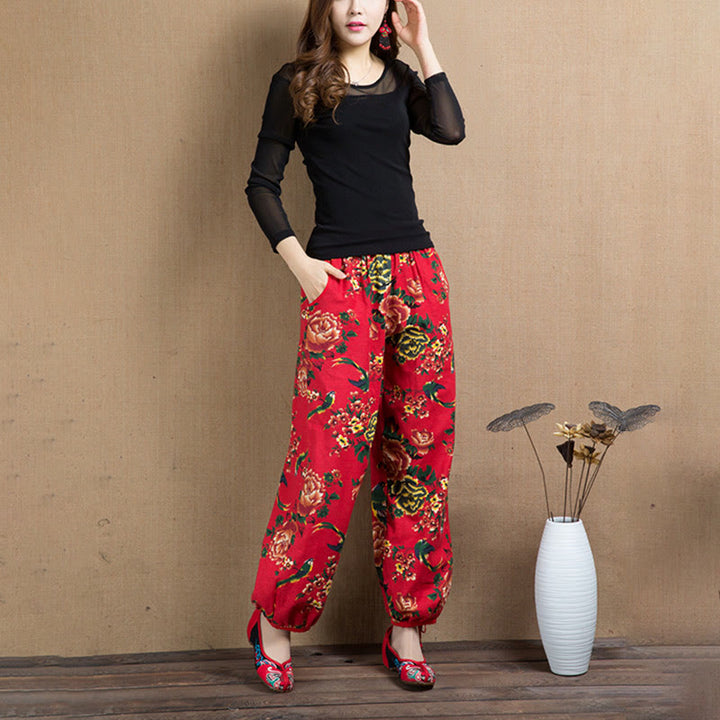 Pantalones bombachos con estampado de flores rojas y verdes de estilo étnico con Buddha Stones y bolsillos
