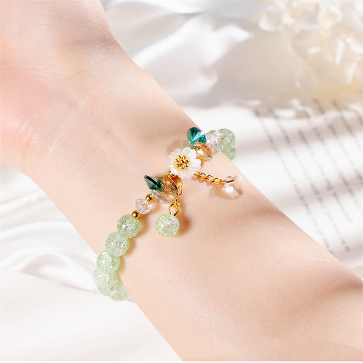 Pulsera de cuentas de cristal con dije de flor de diseño simple con Buddha Stones