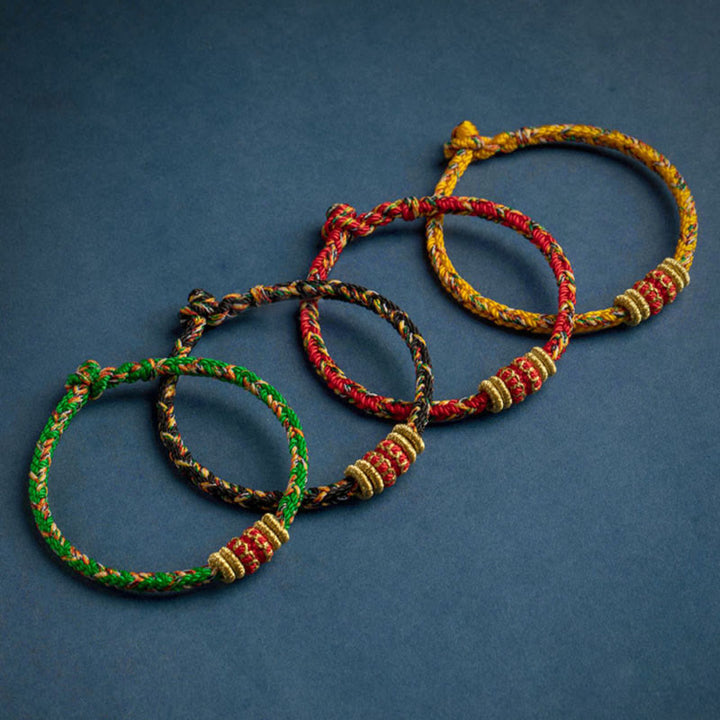 Pulsera de cuerda trenzada de fuerza de la suerte del Buda Natal del zodíaco chino hecha a mano del Tíbet con Buddha Stones