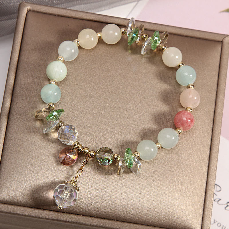 Pulsera con dije de paz y cristal rosa con ojo de gato y Buddha Stones