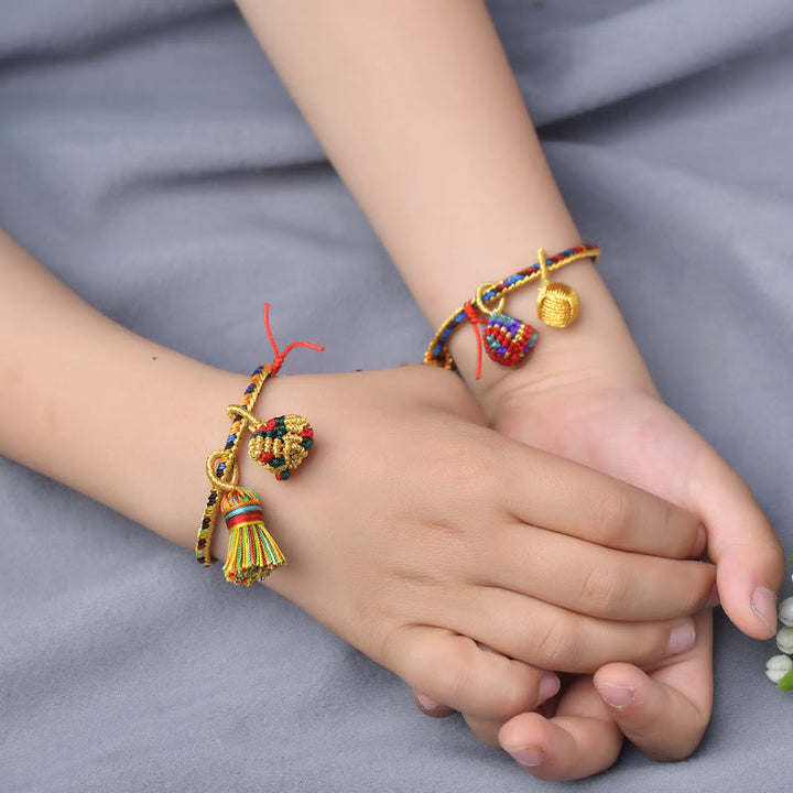 Pulsera con dije de bola dorada Zongzi hecha a mano con cuerda colorida y Buddha Stones