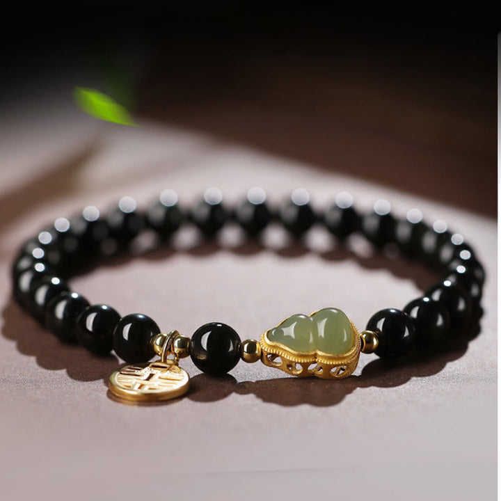Pulsera de fuerza de doble felicidad con calabaza de jade hetiano de obsidiana negra natural