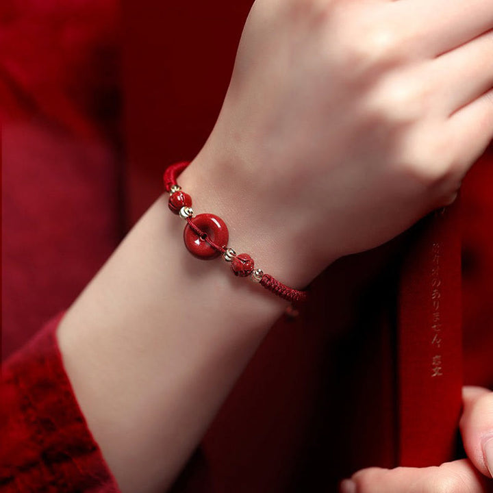 Pulsera trenzada de bendición con hebilla de paz y cinabrio de loto hecha a mano con Buddha Stones